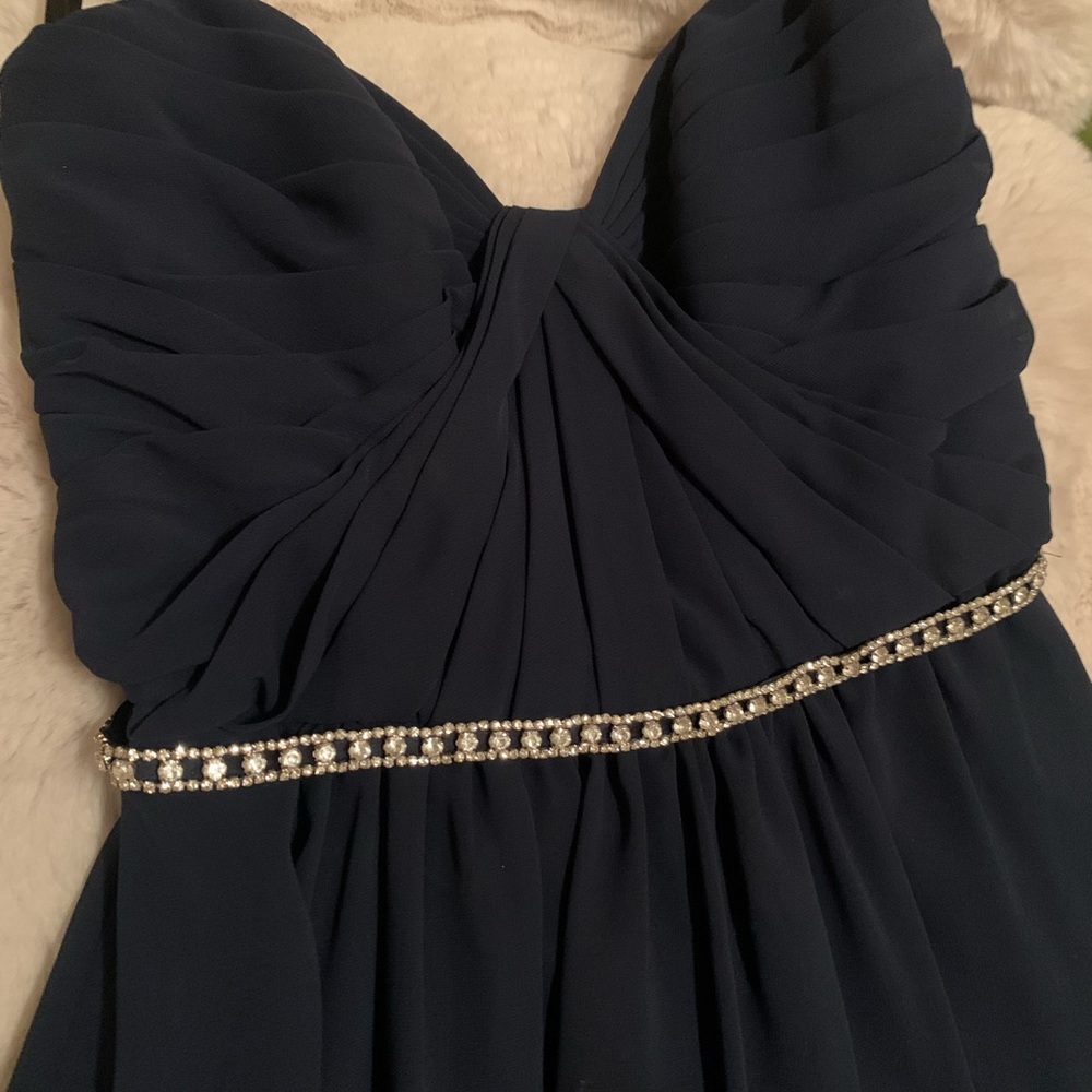 Navy blue Jr bridesmaid dress with rhinestone belt.